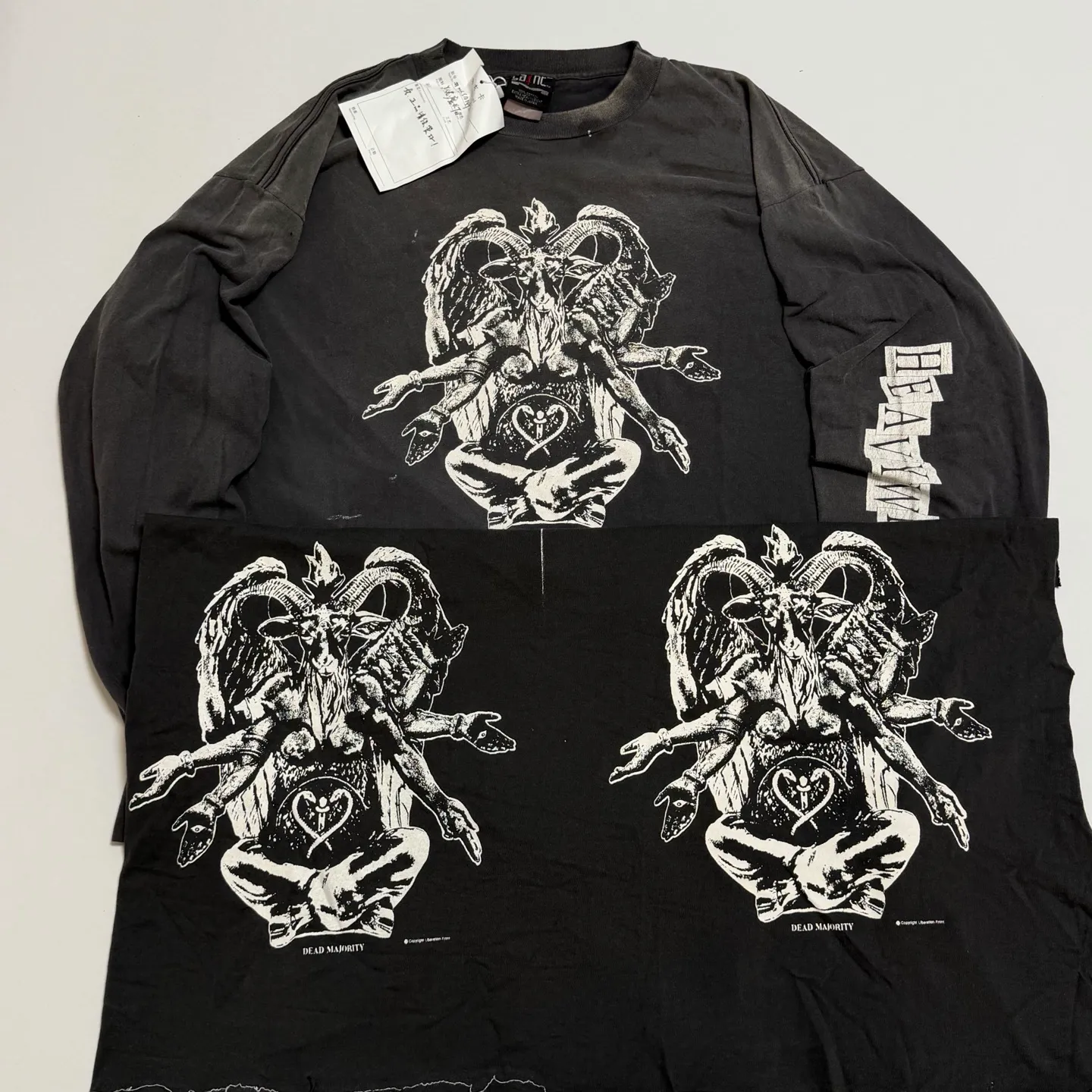 Printed board SAINT Mxxxxxx LS TEE/HEAVY WEIGHT/BLK Sheep head devil distressed long sleeves Washed in black S-XL 25 autumn and winter latest style Cylindrical side seam fabric Rewashed with faded and distressed top printing technology Old crack treatment Correct version Original consistent main mark/washed mark/little angel anti-counterfeiting mark Hand-splashed ink graffiti Wormhole worn Top purchasing level
